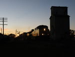 As the sun sets, CBBI cruises through Mineral, IL at track speed. 09-30-10.