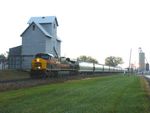 An extra BIRI with almost 140 cars greets Mineral, IL as the sun rises to the east. Iowa 512 is all by itself leading this massive train. 10-25-10