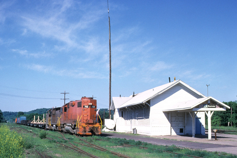 Still kinda looks like the Rock as the J passes the depot at Bureau, IL. Photo by John Dziobko