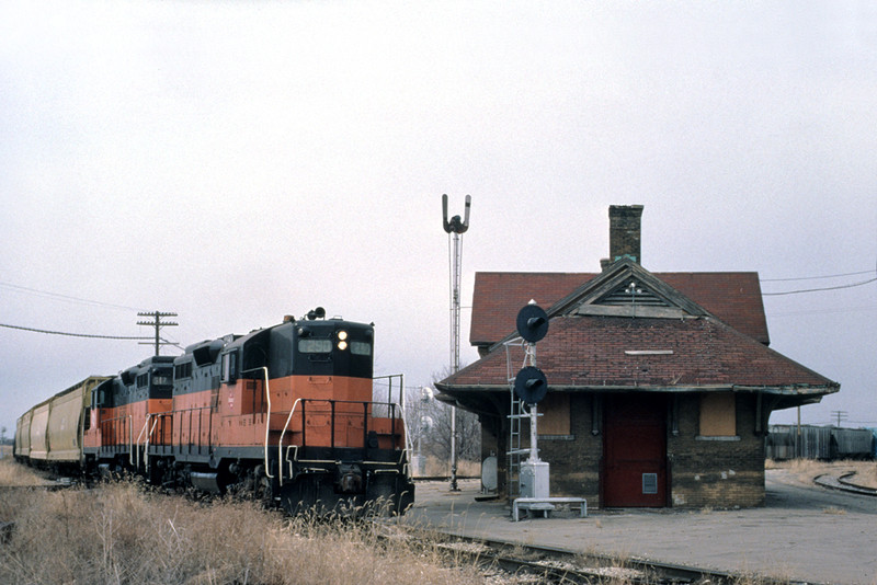 An eastbound MILW freight slaps the diamond of the still intact BCR&N main at West Liberty, March 1981. John Dziobko photo.