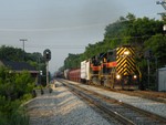 I wanted to re-do this shot at Oak Forest with a train running wrong main, which only happens on weekdays for whatever reason, so here we are, a GP38-2/GEVO combo in Run 8 storming through Oak Forest. Now all I need is a well lit GEVO leading through here and I'm good! 06-23-09