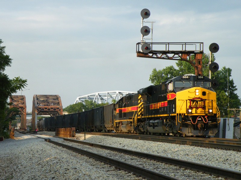 Iowa 504 leads GP38-2 703 on the daily BICB out of Burr Oak yard as they glide across the Cal Sag Channel leaving Blue Island. 07-22-09