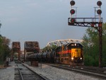 Just as the sun hits the tree line, BIRI blasts off with another pair of GP38-2's and a solid ethanol trainset from the CRL/NS, 05-16-08