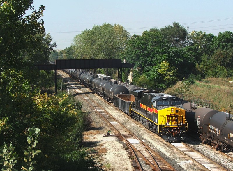 Iowa 510 creeps under the old Joliet Junction with permission from Bridge 407 to start em up.