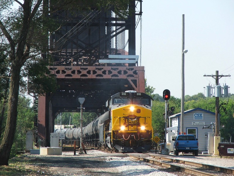 Iowa 510 leads RICSXU through Bridge 407 as the train enters Joliet, leaves CSX trackage, and enters the open arms of Metra...