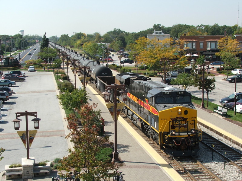 After holding at C.P. 66th Ct for the westbound Metra to cross-over, Iowa 510 and DPU 502 are in Run 8 building speed toward BI. Shot was taken from the Tinley Park clock tower.