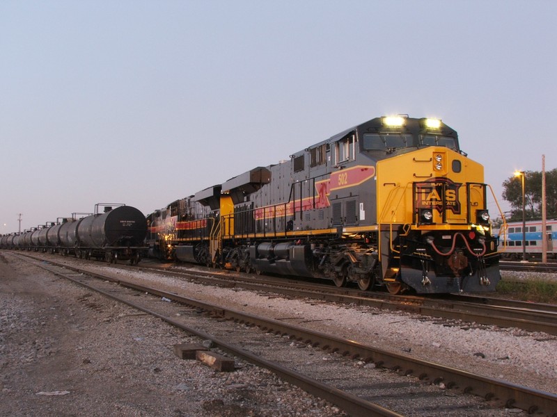 The new GE's prepare to lead their first westbound out of Burr Oak Yard. Of course, with night coming quickly, a quickie timed exposure was all that could be had. The BISW crew ran out of time to get the power on the train so the BICB crew will have to finish the job.