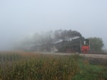 The sun tries to make an appearance as the train approaches Wolcott just out of Durant.