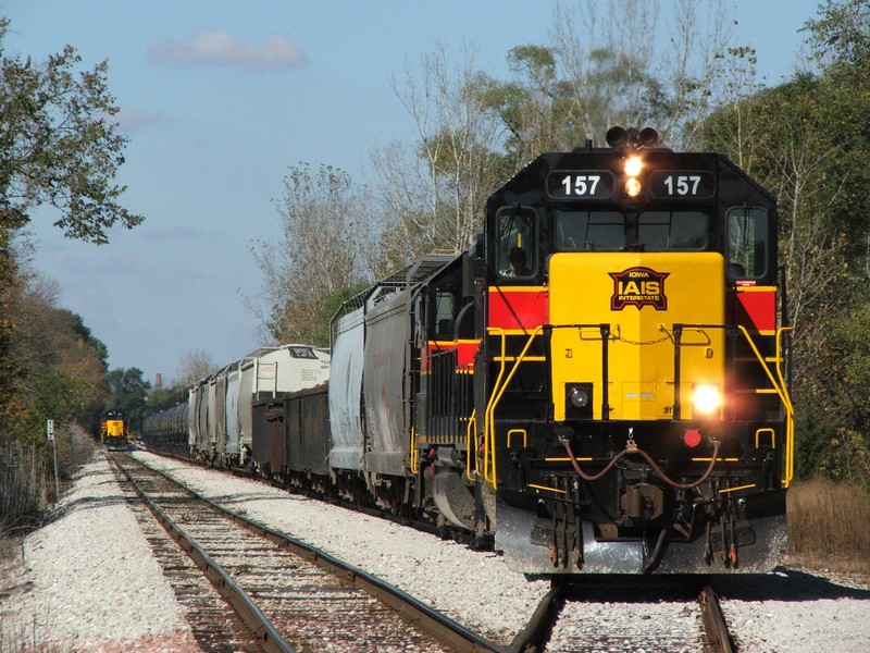 BUSW with 157 builds his air in the siding while CBBI with 155 holds the main. the CBBI will follow the BUSW east. Two SD38-2's on the point after chasing the QJ's across Iowa, can't get much better!