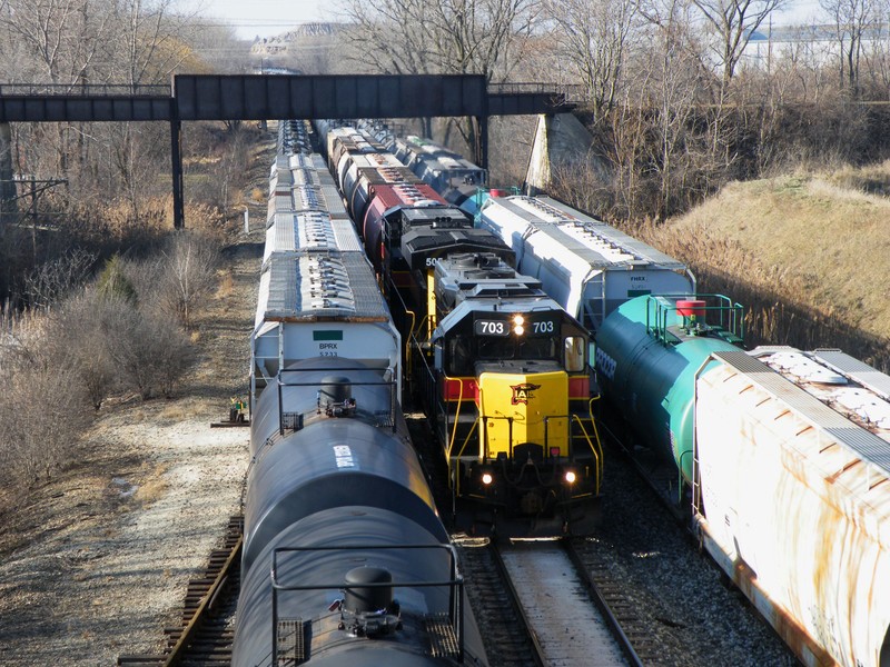 Its a full house in Rockdale as an extra RIBI heads east under the old Joliet Junction with a GP/GEVO combo. 12-28-08