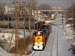 Iowa 151 takes the train around the wye at McCook and is now on the Harbor, heading geographically south, railroad east. This shot is not at all easy to take, as I am standing on I-55. Completely worth it.