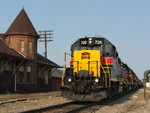 Iowa 720 leads a RINSU type train passed the old RI depot in Ottawa. The depot is now a MoW station for the CSX.