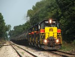 Iowa 720 bounces down CSX's New Rock Sub as the jointed rail eeks and moans. Note the old Rock Island style G signal in the background.