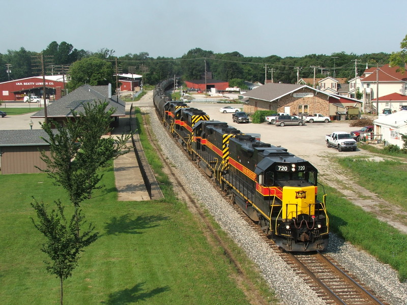 The four EMDs come thundering through Morris working upgrade passed the old RI depot restored in town.