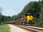 Thundering up grade out of Joliet, the four EMD's are getting a work out as they give my vidoe camera a good show.