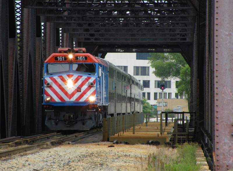 I believe this is as far west as any Metra train set has gone? Metra's Managers Special for 2009 heads through Bridge 407 for Rockdale yard where the train will pause for lunch and head back to Chicago via the Rock and St. Charles Air Line.