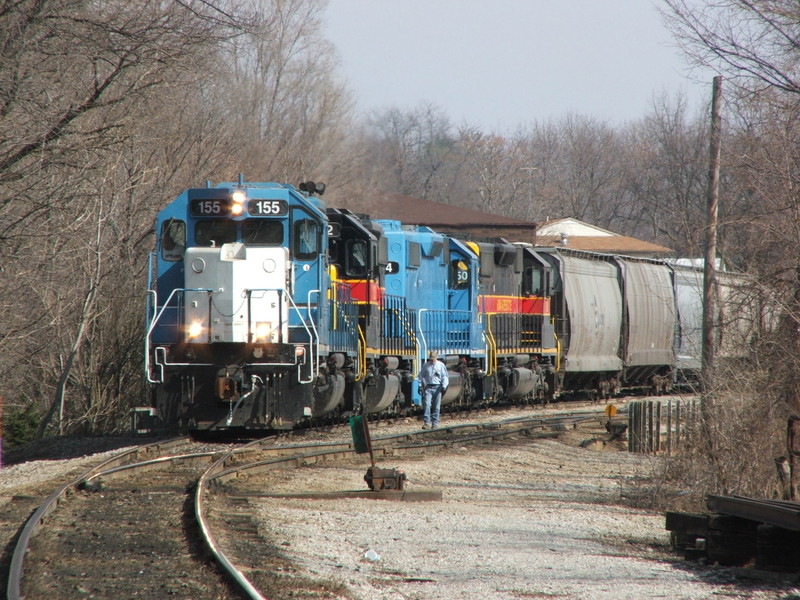 ICCR's conductor walks up to the head end as the train finishes up its air test and prepares to depart Iowa City.