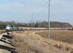 Iowa 155 hits Kent Park curve with its 100+ car train as the sun makes another appearance.