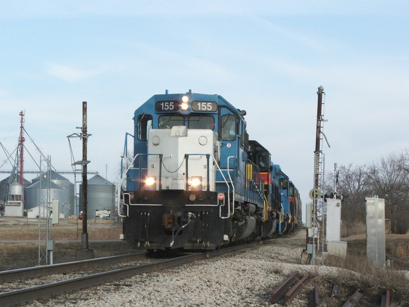 ICCR comes grinding through Homestead splitting the old RI signal masts as the train heads down grade toward the East Yocum switch.