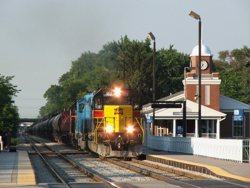 SD38-2 152 leads 155 and a 700 on a BICB through Midlothian, IL. Finally a beautiful sunny shot of an SD38-2 leading the road train. 07-06-07