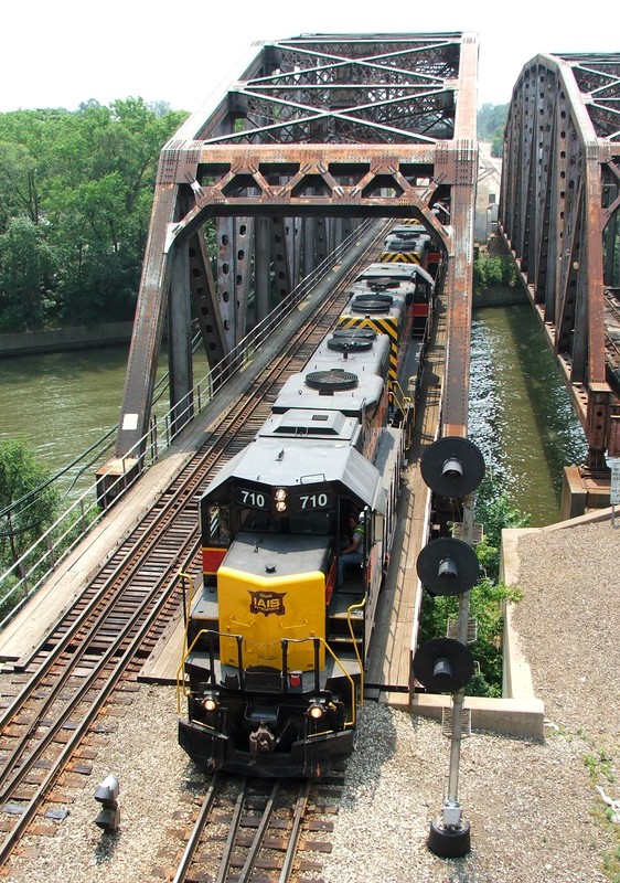 BISW pulls through the steel bridge over the Cal Sag Channel with four GP38-2's, this is the view looking west from the Western Ave. over-pass. 06-17-07