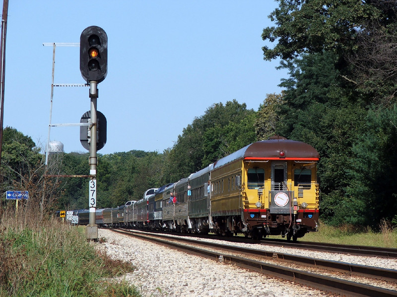 The tail end passes M.P. 37.3 as the train slows for Joliet...