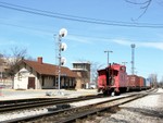 BISW heads west past the Blue Island Vermont St. Depot with Iowa's cupola leading the way. 03-19-06