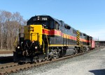 703 and 721 return from Rivderdale as a light caboose hop to Evans Yd. 03-19-06