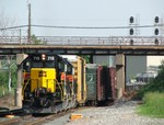 A BISW crew  with 715 and 704 shove a cut of cars down the Harbor for Riverdale Yd. 06-29-06