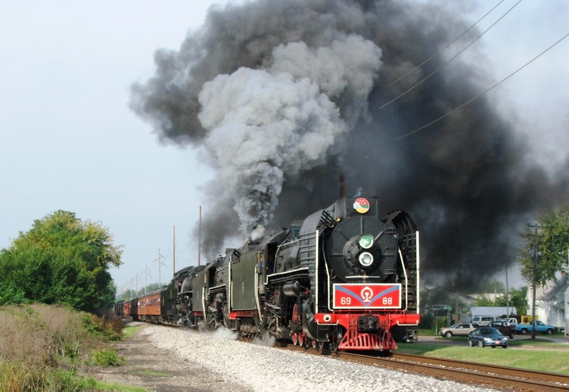 The historic triple header chugs through Moline, IL.