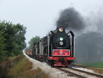 Rolling down grade toward Geneseo, the triple header begins slowing for its second stop.