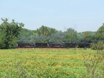 The special heads west over a flood plain in Bureau County. Shortly after this shot, the train made an abrupt 30 min stop due to a stuck brake on the Milw. tool car.