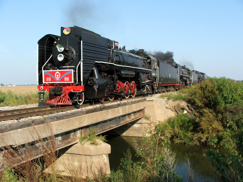 Back underway, the steam engines chug over a viaduct just west of Annawan.