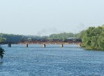 The three steamers chuff out over the Rock River in Colona with the 2006 Riverway Celebration Special.