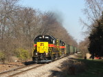 Clear of the slow order, the two GP38-2's smoke it up through the small town of Coughlin, IL