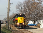 Iowa 708 is down to a crawl as the coal train threads the needle between Rte 29, lake house, and the Upper Peoria Lake. Oh and an El Camino!