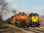 The engineer takes a couple of notches for the photo line as the TZPR retrieves the coal mtys from the Iowa at Peoria.