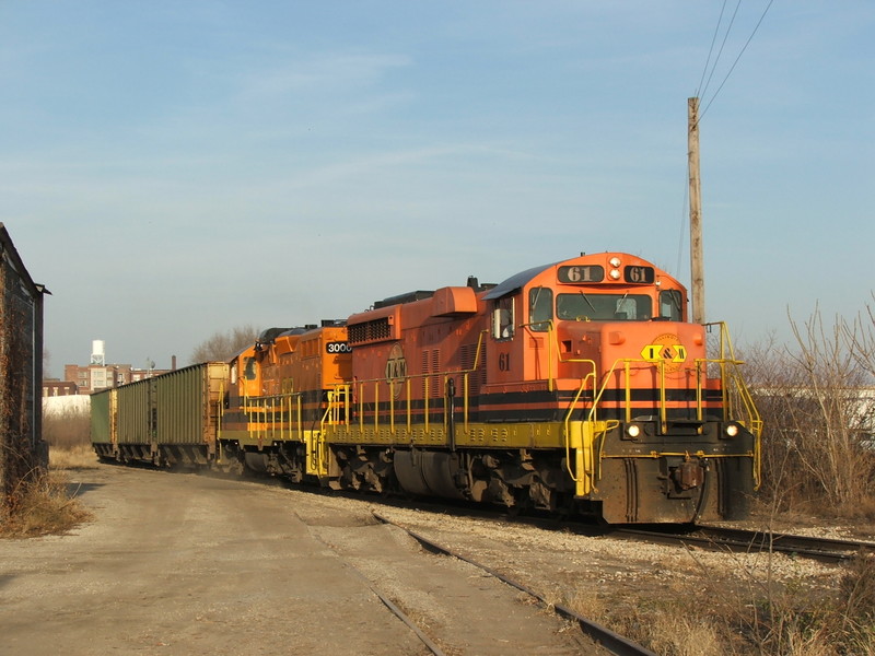 The TZPR coal train heads through the industrial East Peoria landscapes...