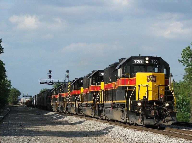 The 5 GP38-2's and 1 GP38 head into the setting sun at Robbins... its too bad I didn't chase this guy, all the units were online and the train was well over a mile in length. 05-28-05