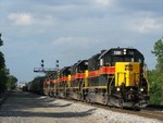 The 5 GP38-2's and 1 GP38 head into the setting sun at Robbins... its too bad I didn't chase this guy, all the units were online and the train was well over a mile in length. 05-28-05