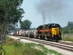 720 and 712 are in run 8, thundering up the grade out of New Lenox with a CBBI. 07-24-05