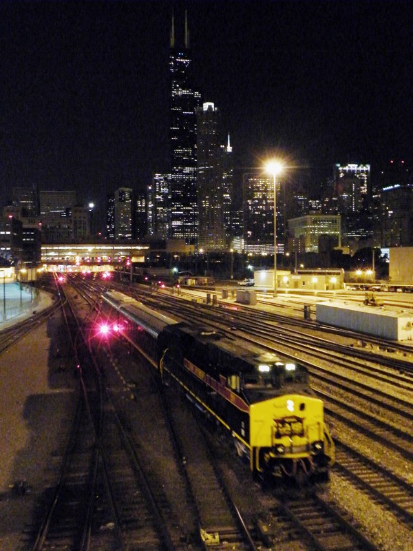 Iowa 511 backs under Roosevelt Rd. and heads into CUS. In all my years past, present, and future, taking pictures, I never thought I'd ever see an IAIS train pictured here with the skyline in the background like many famous photographs before this.