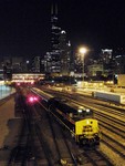 Iowa 511 backs under Roosevelt Rd. and heads into CUS. In all my years past, present, and future, taking pictures, I never thought I'd ever see an IAIS train pictured here with the skyline in the background like many famous photographs before this.