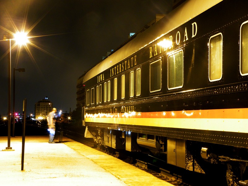 The Metra Pilot and IAIS conductor exchange thoughts as the business train holds for the signal at BNSF's Halsted St station.