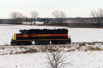 Coal empties crew, on lead unit 703,  backs down to their train after spotting a car at JM.  Dec. 11, 2005.