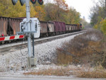Work 700 takes its ballast train east on N. Star siding, Oct. 24, 2005.