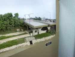 The MLK Jr. Parkway passes over the middle of the prototype yard, but serves as the eastern boundary of the model. The photo backdrop was created from street view shots in Google Earth.