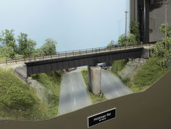 The model was shortened from the prototypes four spans to two, but otherwise is a near match. Safety railings run along the west side of the span.