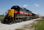 The Hawkeye Express sits in Vernon siding with IAIS 720 and IAIS biz car Hawkeye at Coralville, IA on 15-Sept-2006.