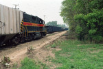 Northbound Peoria Rocket (eng 707) arrives at Chillicothe to pick up sand and tank cars, after bringing 27 empty CHs up from Peoria.  Aug. 26, 2005.